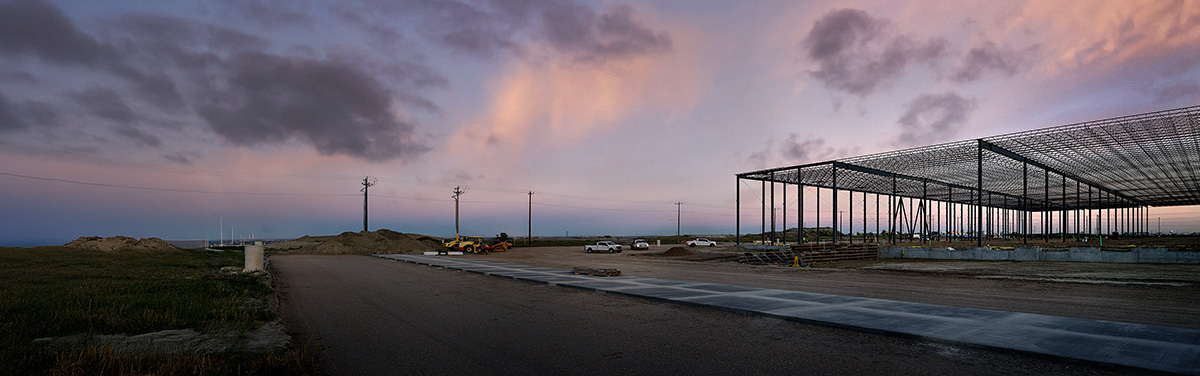 construction site of a commercial building with the structure framing in progress 